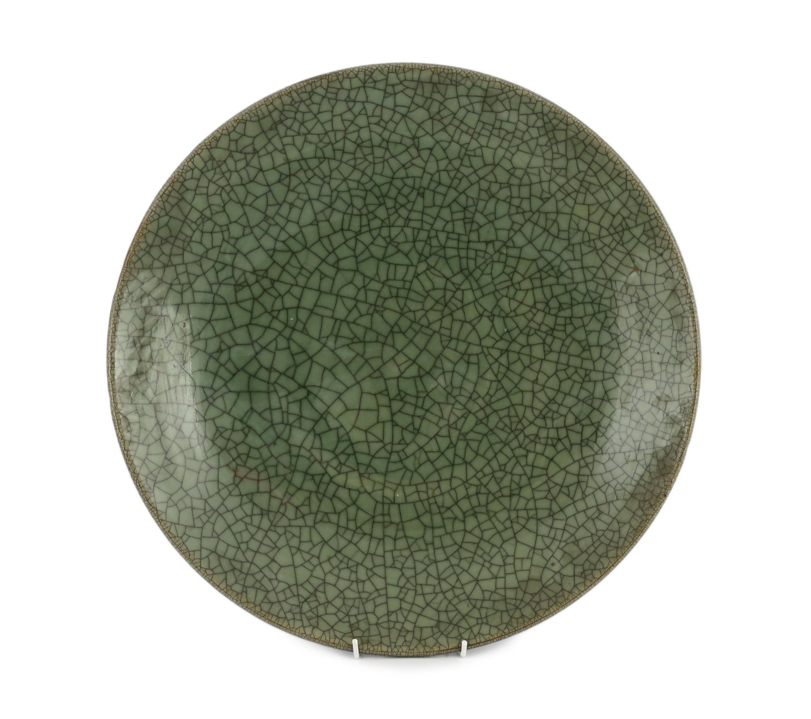 A large Chinese Guan type crackle glaze dish, 19th/20th century, 45.5cm diameter